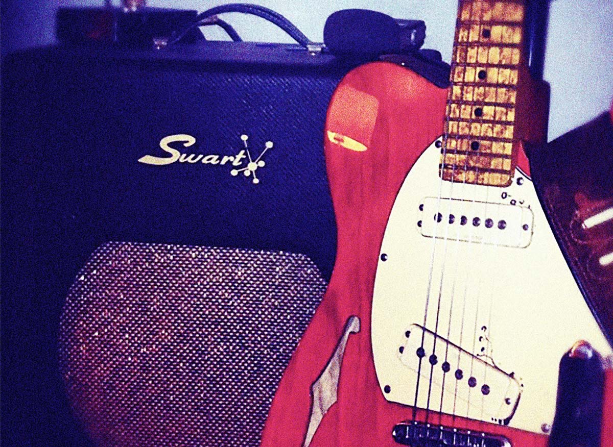G&L semi-hollow guitar and Sward amplifier.