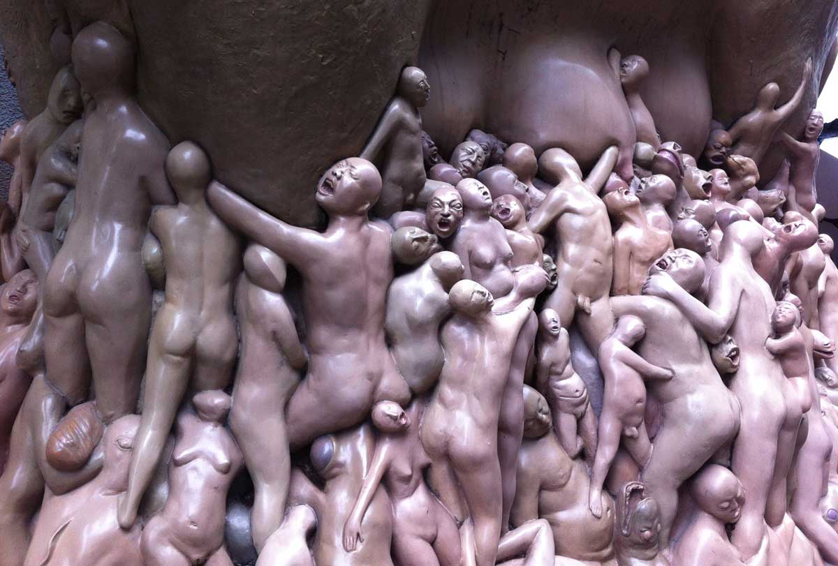 Thousands of little people scrambling at a procelain cow's udder